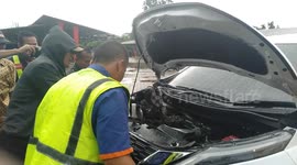 1 - Five meter-long python captured from inside a car engine while in-house parking at Indonesian international airport
