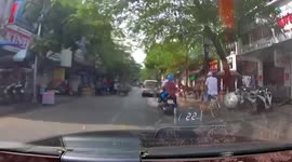 Motorcycle Rider Smashes Into Oncoming Car