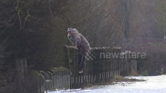 Amusing video of pedestrian in Storm Bella floods.