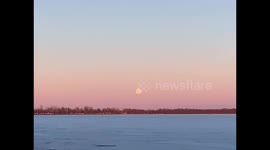 Incredible sunset / moonrise in Canada