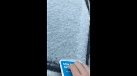 Satisfying ice scraping on a cold morning in Sweden