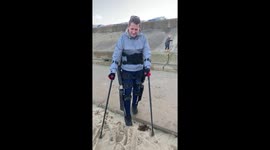 Paralysed Man Walking On The Beach First Time In 10 Years, Thanks To His Exo-Skeleton Suit