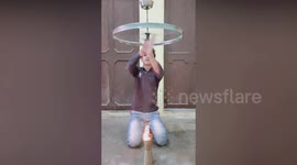 You won't believe what this 15-year-old can balance on his head