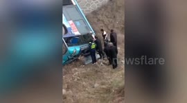 Ambulance collides with bus in northwestern China leaving one dead and 14 injured