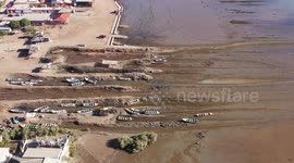 Aerial view of fishing boats in the mud or mud of the estuary in the community of Paredón Colorado or also called Paredón Viejo is a ranchería in the municipality of Benito Juárez, located in the south of the Mexican state of Sonora, on the coast