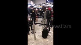 Minimal social distancing at London's Heathrow Airport amid increasing COVID-19 numbers