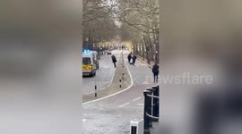 Police seen chasing anti-lockdown protesters near Parliament Square in London