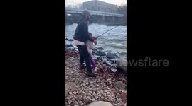 Watch this adorable father-daughter moment as 9-year-old catches huge fish in Michigan