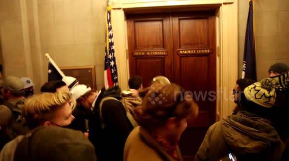 Stop The Steal Protester Attempts To Break Mitch McConnell's Door on January 6th, 2021