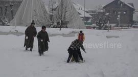 Kids enjoy fresh snowfall in Jammu and Kashmir