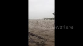 Heavy rain from ex-Tropical Cyclone Imogen floods river in Queensland