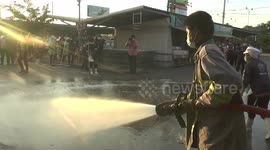 Supermarkets sprayed with disinfectant amid second wave of COVID-19 cases in Thailand