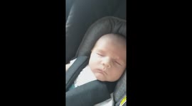 Funniest noises (sounds like a dolphin) made by baby in moving car on the way to do some shopping