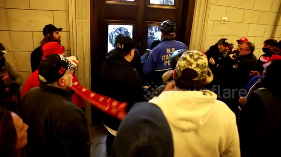 Newsflare Edit - Stop the Steal Protesters Continue Attempts to Break Into United States Capitol Building on January 6th, 2021