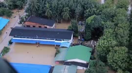 One dead and more than 100,000 evacuated after floods ravage southern Thailand
