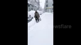 Rare blizzard covers Madrid in deep snow causing travel chaos