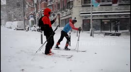 Skiers take to Madrid streets as Storm Filomena buries city in snow