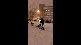 Man seen mushing a pack of huskies during Storm Filomena