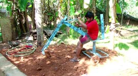 Watch -More footage - Father become a local star after making JCB machine from waste for his two sons