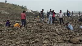Villagers in central India dig riverbed in search of missing hoard of Mughal-era coins