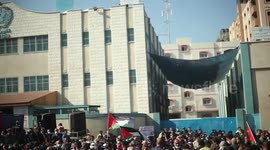 Palestinians in Gaza demonstrate against UN agency's service reduction
