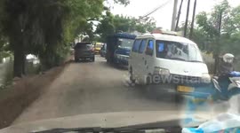 PLAY AND WASH IN POLUTE IRRIGATION CHANNEL