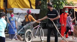 Market doused with disinfectant as Thailand grapples with COVID-19 cases