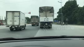 Truck Awkwardly Tilted After Running Over Metal Barriers