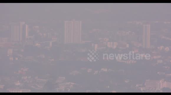 A blanket of dense smog due to crop burning shrouds Chiang Mai, Thailand