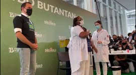 Nurse receives first vaccine dose in Brazil after health regulators gave emergency approval to two jabs