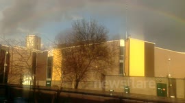 Rainbow in white city