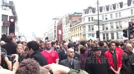 Thatcher protesters turn their backs