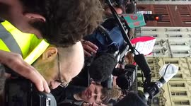 Two gentlemen arguing over Thatcher's legacy.