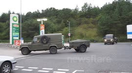 British Army convoy fills up at petrol station somewhere in the UK 1/3