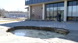 Large sinkhole opens up in Toronto parking lot