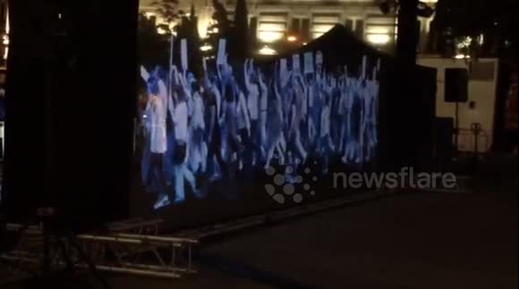 Holographic march in Madrid over protest laws