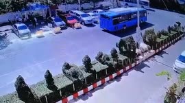 Bus driver crashes into second bus and row of parked cars after making tight turn