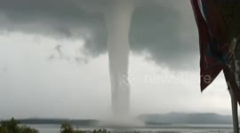 Huge waterspout spotted out over reservoir in central Indonesia