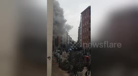 Emergency crews on scene as smoke billows from explosion site in Madrid, Spain