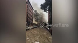 Rubble and debris strewn across Madrid street after fatal explosion