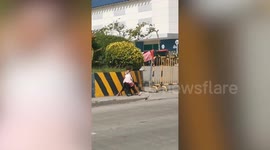 Little girl rides her dog home in Phlippines