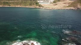 A drone view of Tung Lung Chau's lighthouse and camping grounds in Hong Kong