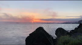 Watch this stunning time-lapse of Seattle as coastal fog ebbs and flows as the sun rises