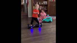 1 year old riding Hoverboard