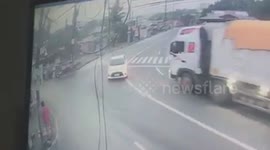 Three killed after truck topples over on tight bend in the Philippines