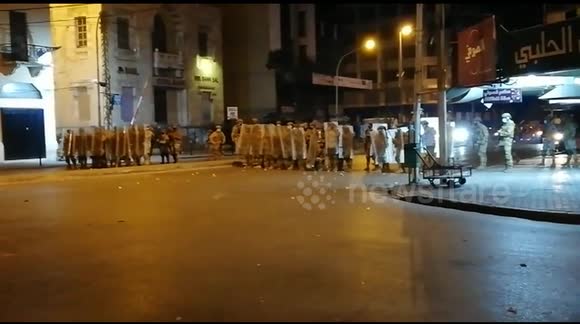 Lebanese protesters clash with police over lockdown restrictions