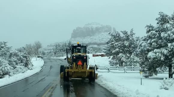 Red Rock in Arizona sacked with heavy snow, picturesque scene created