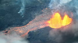 Terrifying aerial view of spewing lava from helicopter