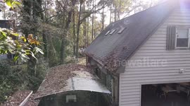 Using a drone to clear leaves from the roof