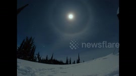 Guy films video of particularly impressive moon halo while camping in the British Columbia mountains